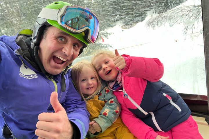 a person holding a baby